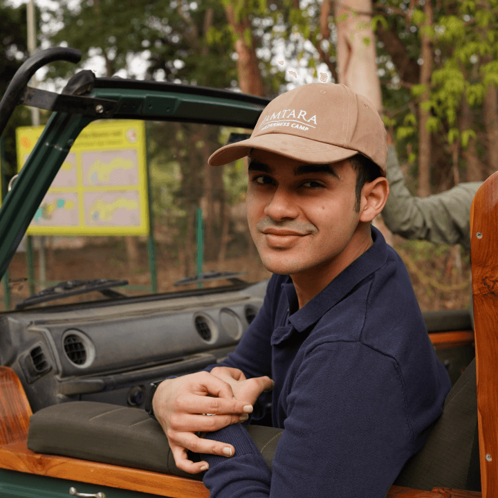 Karan Sancheti sitting in a vehicle